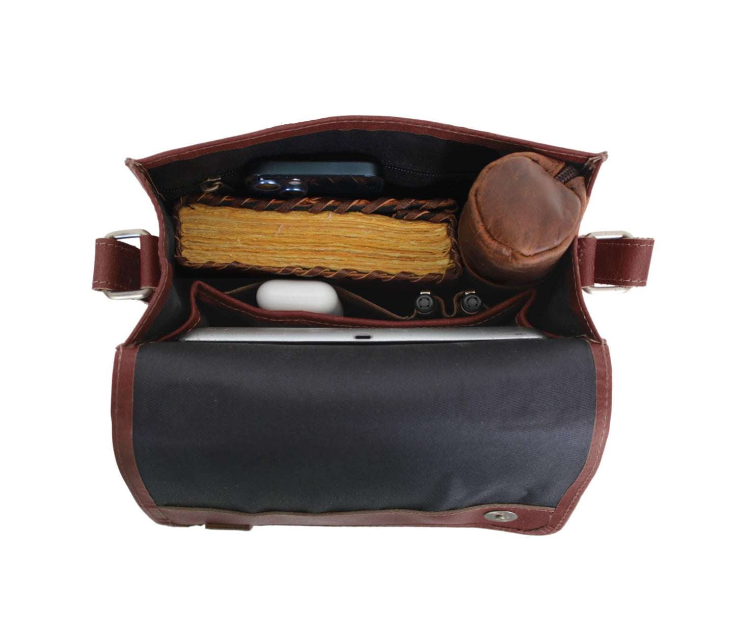 This handcrafted buffalo leather satchel blends rustic charm with everyday functionality, making it a perfect personalized gift for men and women. Designed with a sturdy top handle, quick-access front pocket, and adjustable strap, it’s ideal for carrying gadgets, journals, and daily essentials. The vintage-distressed finish adds timeless appeal. A thoughtful graduation or birthday gift, this customized vertical crossbody bag offers durability, style, and practicality for work, travel, or study.