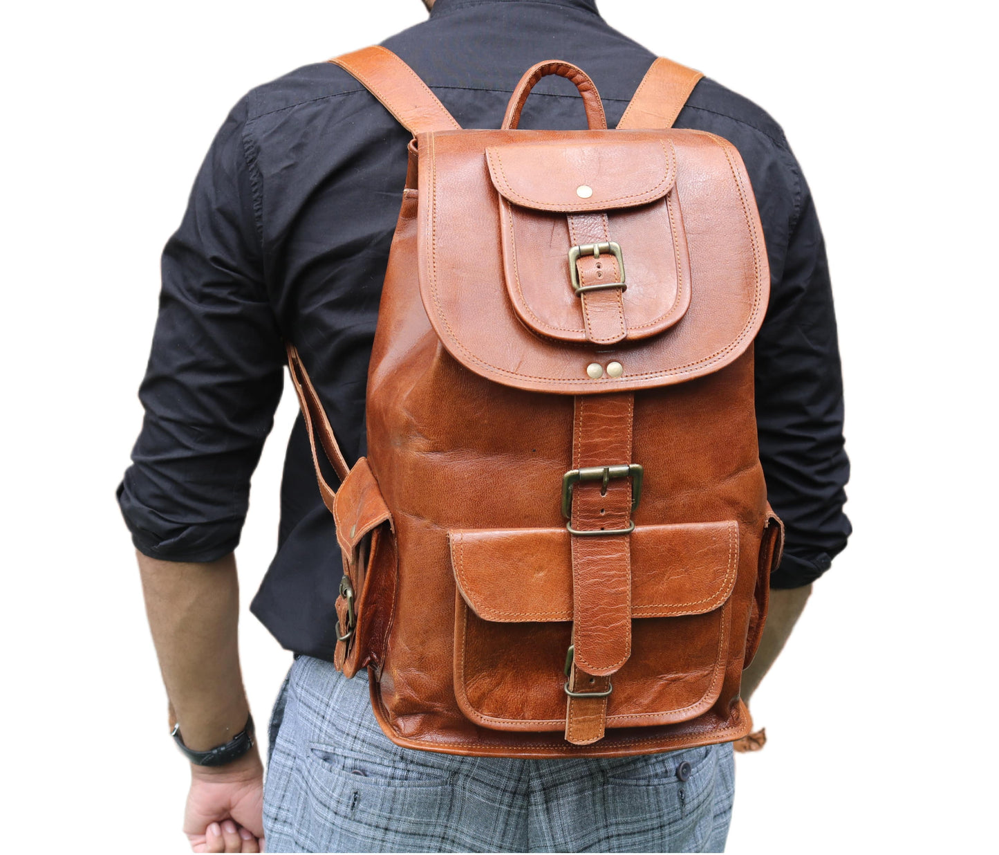 This Brown Genuine Leather Backpack For Men Is Designed Modern Professionals And Travelers. The Rich Color Smooth Full-grain Texture Exude Sophistication, While Adjustable Padded Straps Ensure All-day Comfort. It Features A Secure Flap Closure With Brass Hardware, Multiple Front Pockets Quick Access, Spacious Main Compartment Laptops, Books, Daily Gear. Ideal As Laptop Backpack, Office Bag, Or Stylish Travel Companion, Offers Perfect Blend Of Durability Elegance Work, School, Adventure.