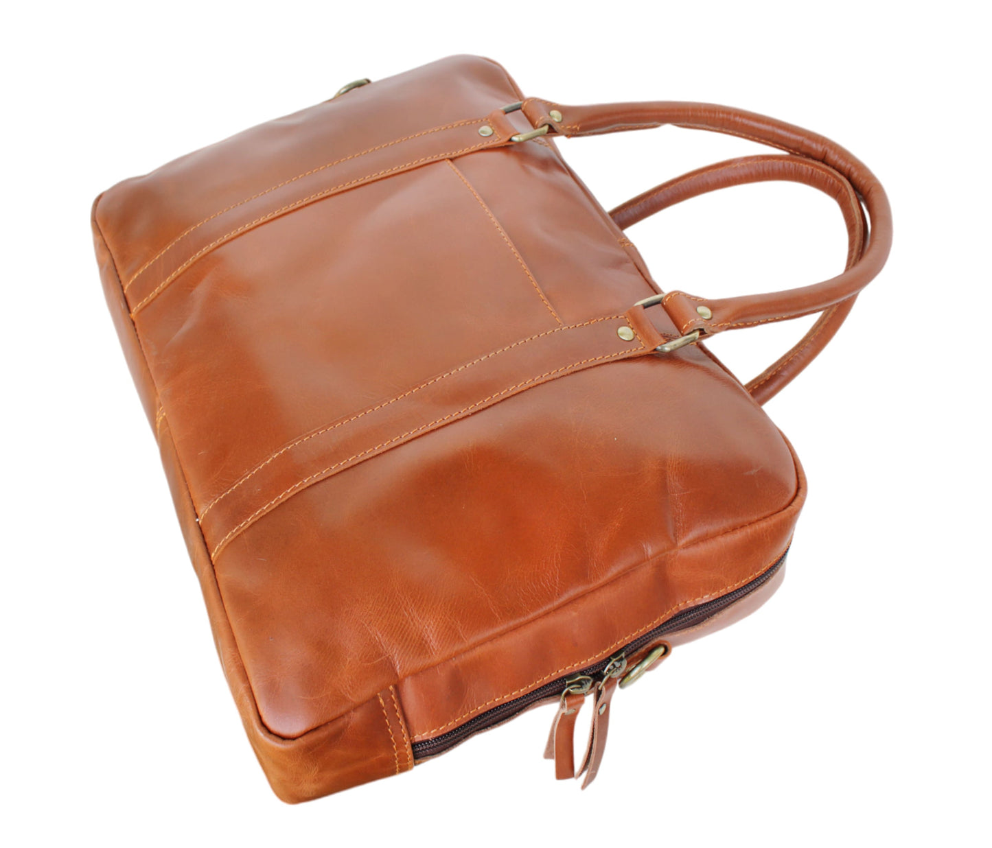 Engineered For Elegance And Durability, This Full-grain Leather Office Bag Features A Structured Silhouette With Reinforced Top Handles Sturdy Dual-zippered Main Compartment. Its Wide Base Sleek Curves Offer Ample Space Laptops, Documents, Chargers, Daily Essentials—all While Maintaining Polished, Professional Look. Clean Rear Paneling, Minimalist Stitching, Premium Zippers Reflect Superior Craftsmanship. Perfect Business Meetings, Corporate Travel, Or Everyday Use, Laptop Blends Form Function.