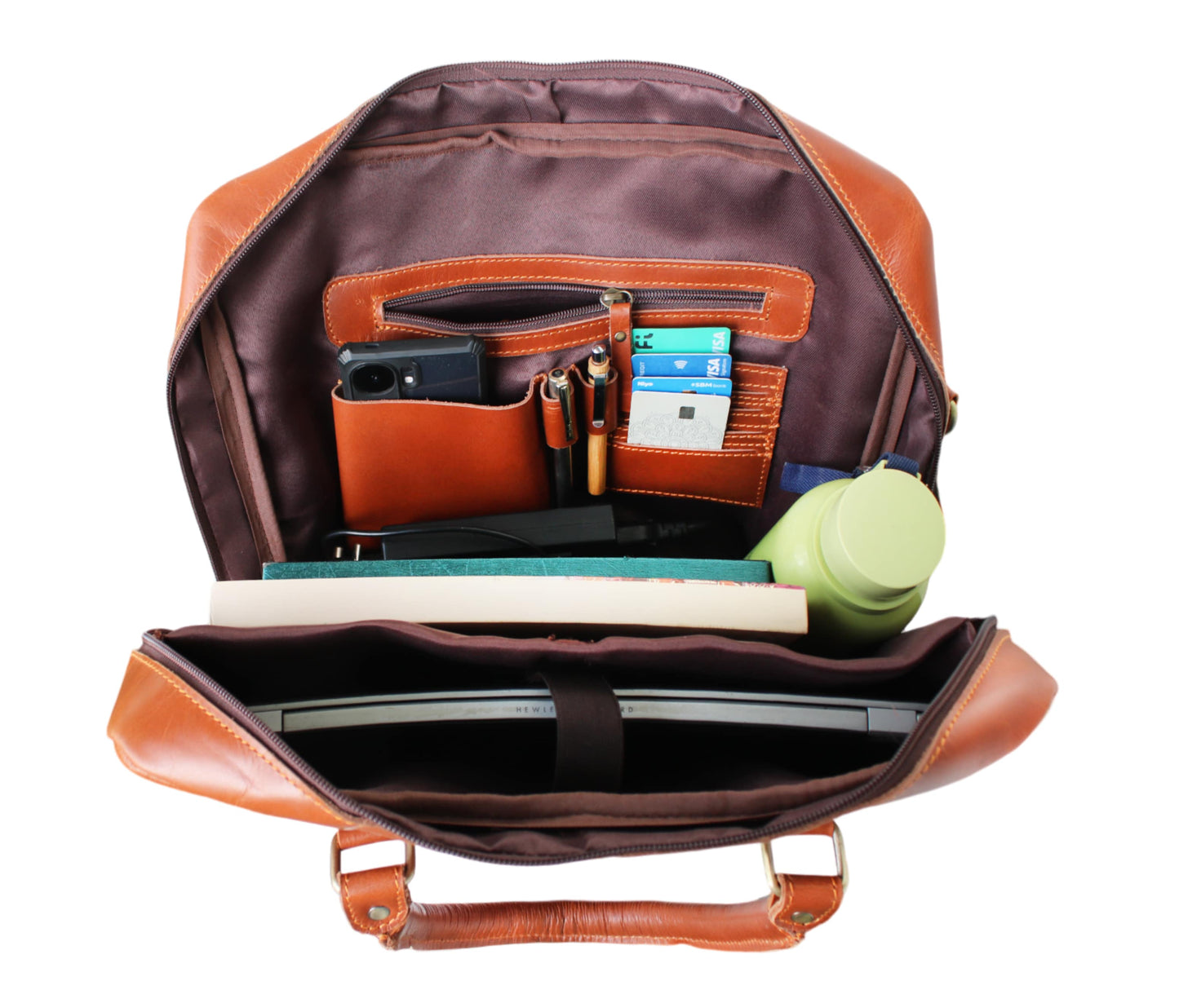 Designed For Efficient Organization, This Leather Office Bag Features A Spacious Interior With Dedicated Compartments To Keep Everything Neatly Arranged. Padded Laptop Sleeve Secures Your Device Velcro Strap, While Front Pockets Hold Phone, Cards, Pens, And Small Accessories Like Wallets Or Keys. The Roomy Main Compartment Fits Notebooks, Folders—even Water Bottle. Crafted Durable Inner Lining Premium Exterior, It Combines Timeless Elegance Functional Storage.