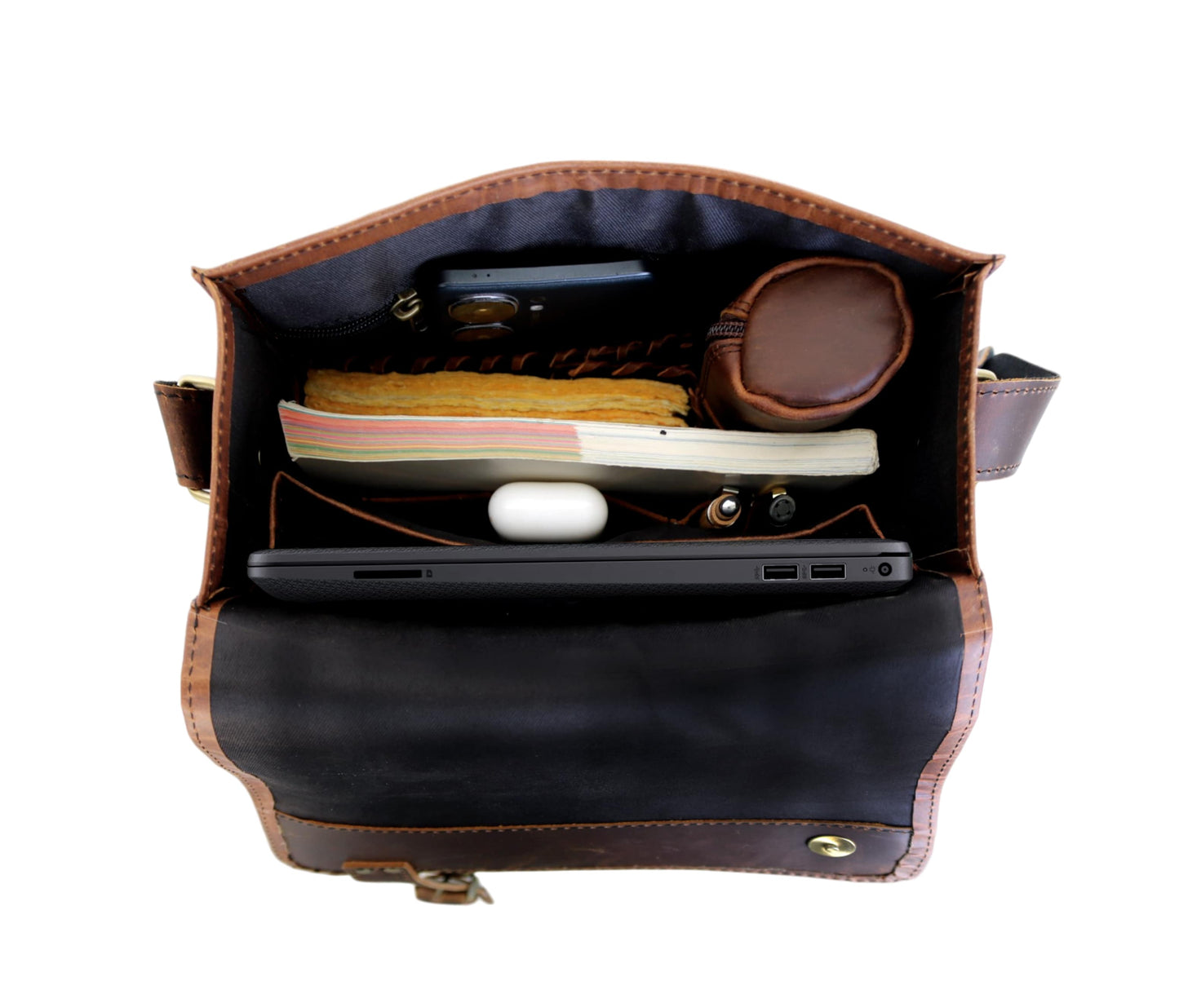 This Image Showcases The Interior Of A Leather Crossbody Bag, Revealing Its Well-organized And Spacious Design. Crafted For Everyday Functionality, It Neatly Accommodates Essentials Like Notebook Or Journal, Slim Tablet Laptop, Wireless Earbuds. Additional Compartments Securely Hold Smartphone, Medicine Pouch, Writing Instruments In Dedicated Pockets Sleeves. Thoughtful Layout Strikes Perfect Balance Between Functionality Compactness, Making An Ideal Personalized Customized Gift Men And Women