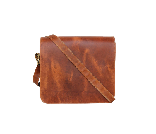 This Personalized Leather Messenger Bag Is Expertly Handcrafted From Full-grain Leather, Featuring A Rich Rustic Tan Brown Finish That Naturally Develops Character Over Time. Designed For Both Style And Utility, It Includes An Adjustable Strap Comfortable Crossbody Or Shoulder Wear. The Sleek Flap Closure Gives Clean, Minimalist Look, Making Ideal Daily Errands, Work, Casual Outings. Its Slim Silhouette Perfect Carrying Essentials Like Tablet, Small Notebook, Phone, Documents. Thoughtful Customized Birthday