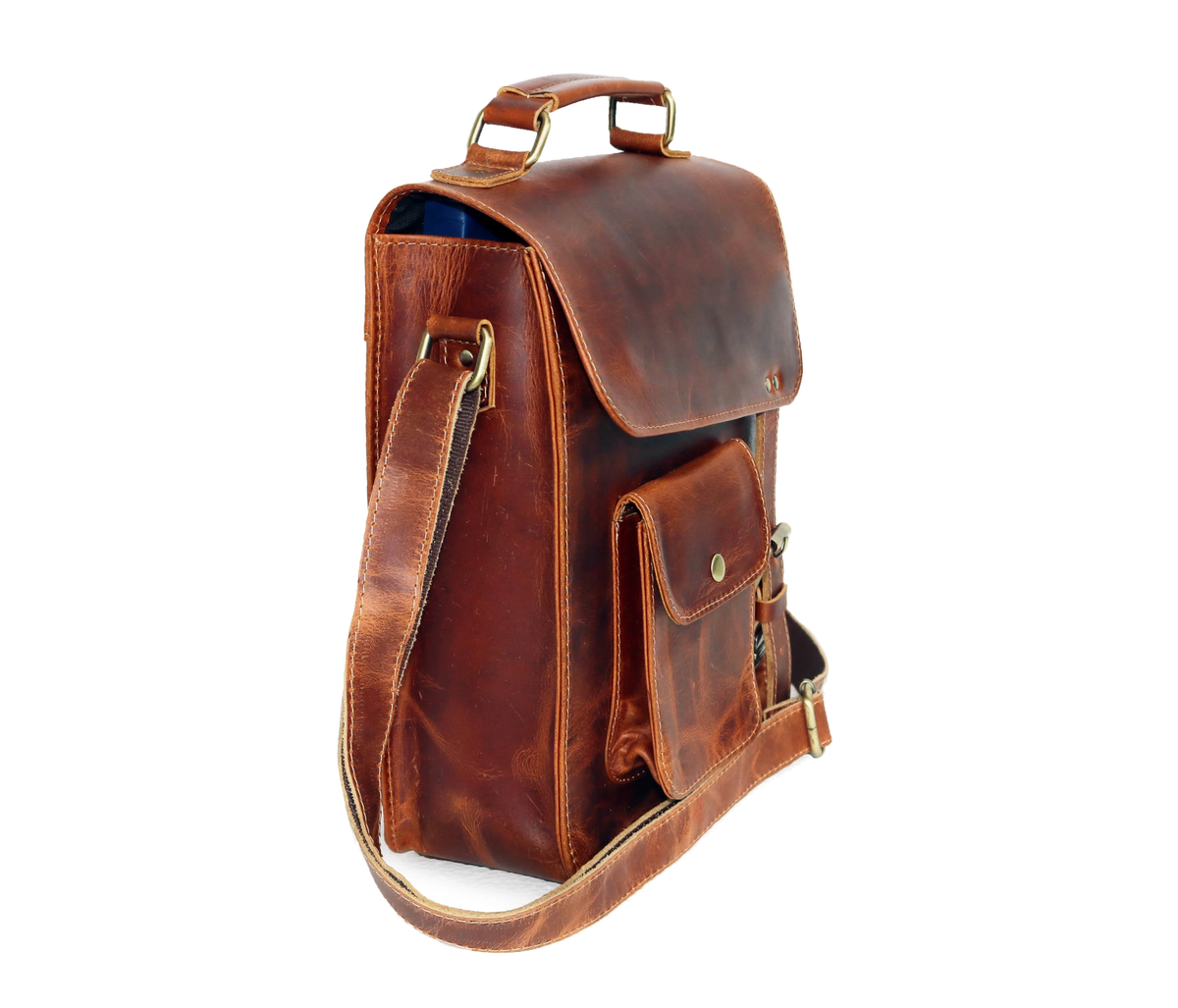 This Side-angle View Showcases The Refined Silhouette Of A Handcrafted Crossbody Bag, Made From Full-grain Buffalo Leather In Rich Tan-brown. Its Sleek, Upright Structure Features Wide Flap Closure, Snap-button Front Pocket, And Brass-finished Adjustable Strap. Blending Style Utility, Piece Is Perfect Personalized Gift For Men Women, Ideal As Graduation Gift, Birthday Or Customized Everyday Essential With Timeless Appeal.