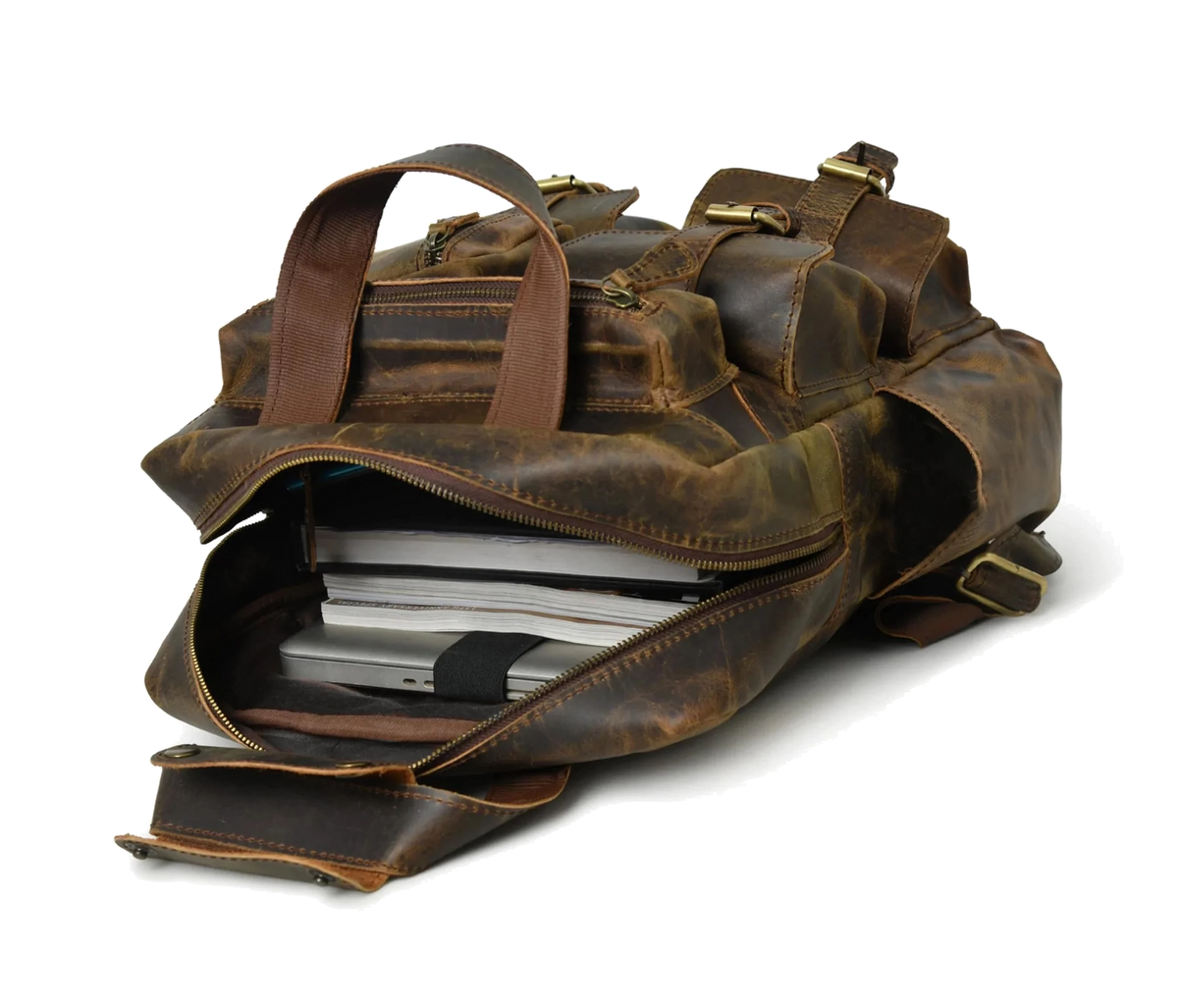 Experience The Perfect Blend Of Style, Durability, And Functionality With This Handcrafted, Personalized Genuine Leather Backpack. Designed For Modern Professionals, Travelers, Students, It Features A Spacious Main Compartment To Securely Hold Laptops, Tablets, Books, More. Multiple Zippered Pockets Keep Essentials Organized, While Reinforced Stitching Premium Hardware Ensure Long-lasting Use. Vintage Finish Adds Timeless Appeal, Padded Adjustable Straps Provide All-day Comfort. Customized Gift Men Women 