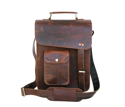 This Image Showcases A Sophisticated Handcrafted Leather Crossbody Bag Made From 100% Genuine Buffalo In Rich Dark Brown Finish. The Natural Texture Variations Lend Rustic Yet Refined Look. It Features Prominent Flap With Concealed Push-lock For Added Security And Quick-access Front Pocket Snap-button Closure Convenience. Padded, Adjustable Shoulder Strap Sturdy Webbing Ensures Comfortable Carrying. Perfect Personalized Customized Gift Men Women—ideal As Birthday Or Graduation Gift