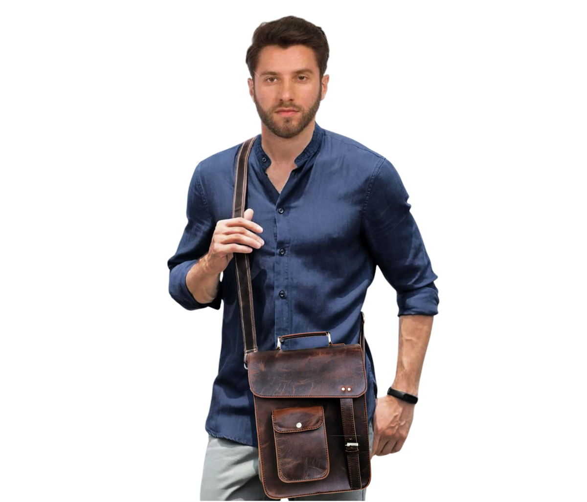 This Image Showcases A Man Wearing Stylish, Vintage-inspired Leather Crossbody Bag Crafted From Distressed Buffalo Leather, Giving It Rugged, Classic Look. The Features Flap Closure With Metallic Studs And Buckle Strap For Added Security. Front Includes Convenient Quick-access Pocket, Ideal Items Like Keys Or Wallet. Adjustable Shoulder Ensures Comfortable Wear, While Overall Size Design Make Perfect Daily Essentials, Travel, Casual Outings